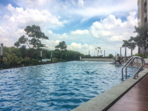 Homey Studio at The Oasis Cikarang Apartment By Travelio